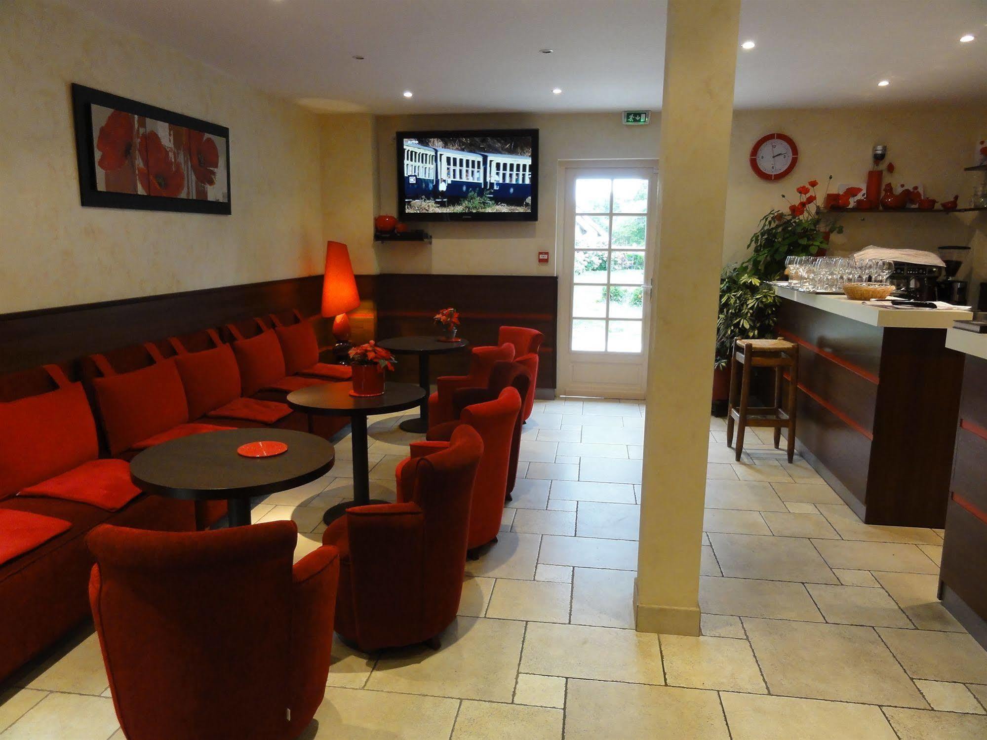 Hotel Restaurant Les Coquelicots, The Originals Relais Saint-Pardoux-l'Ortigier Restaurante foto